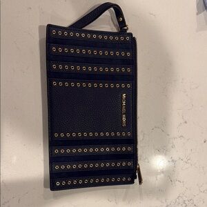 Michael Kors Navy Wristlet with Gold Eyelets